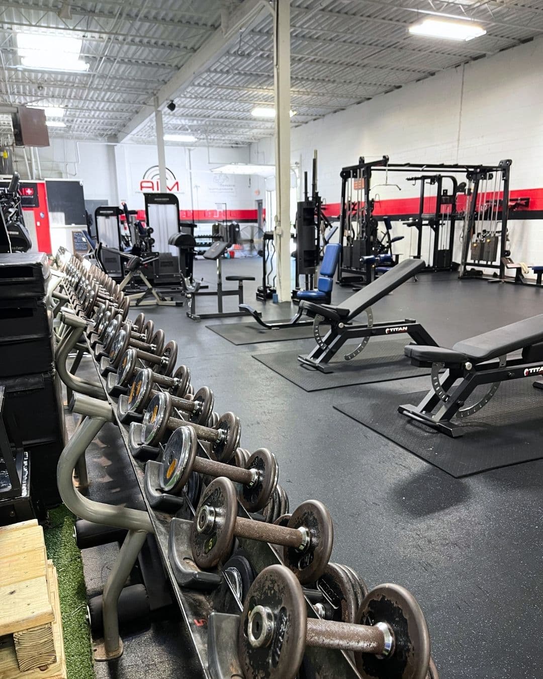Dumbbell rack and gym floor at AIM Performance Training in Mentor, Ohio