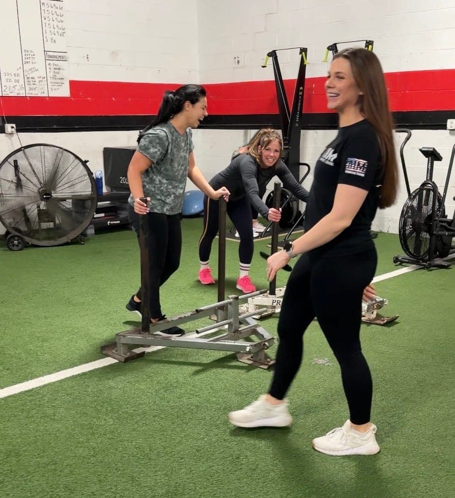 Karly Birtley coaching a group fitness class at AIM Performance Training in Mentor, Ohio